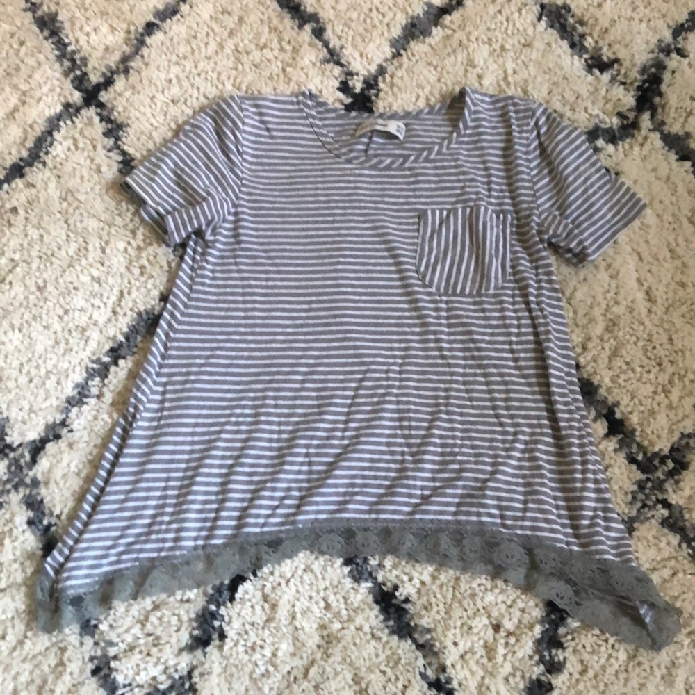 Girls medium t shirt with grey and white stripes.